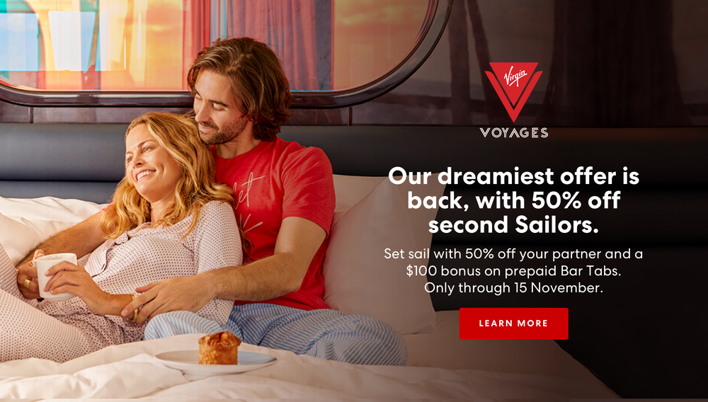 Couple in stateroom on a Virgin Voyages Cruise, Deal 2nd Sailor Sales for 50% Off