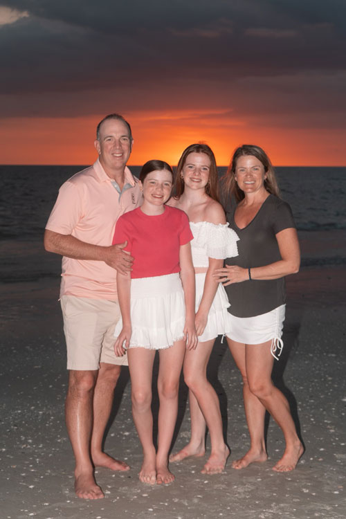 Laura Donovan with her family. She is a Travel Agent at Favorite Grampy Travels.