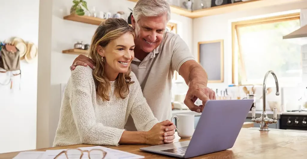 ETIAS - Filling out the online Travel Authorization form - Favorite Grampy Travels Couple filling out their online ETIAS European Travel Authorization application for travel.
