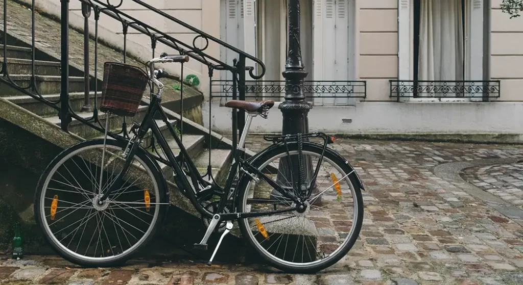 European street scene with bicycle - Favorite Grampy Travels European street scene with bicycle leaning against stair railing.