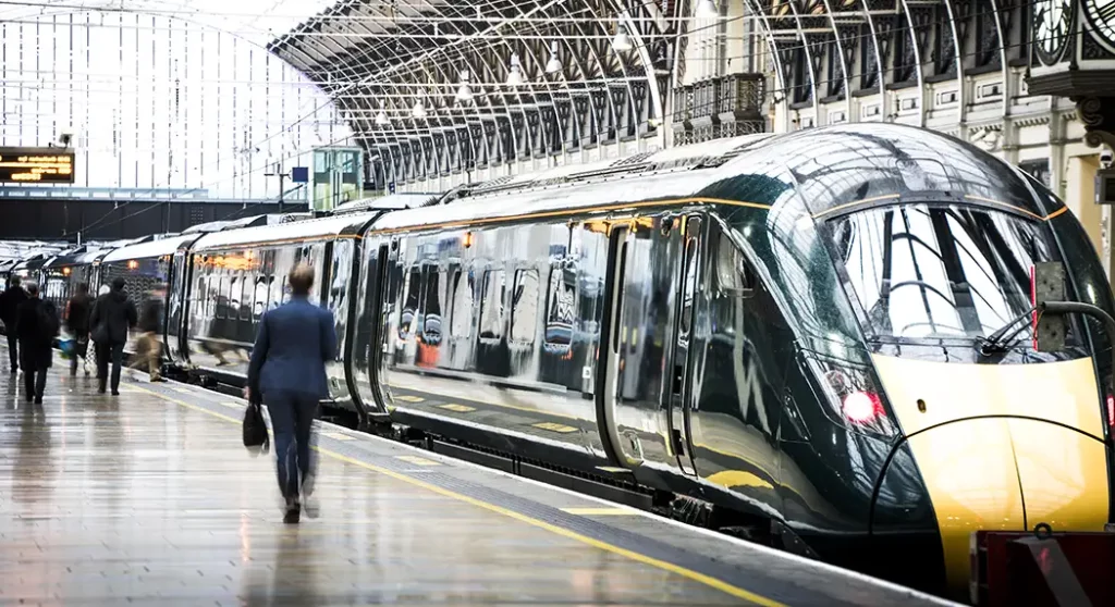 Train station platform in Europe - Favorite Grampy Travels Train station platform in Europe with passengers.