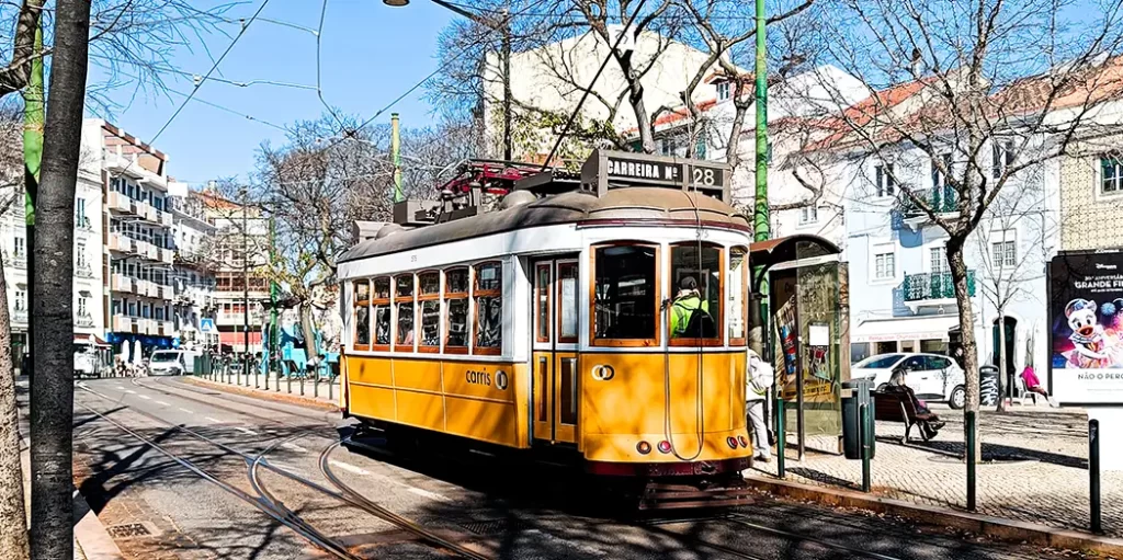 European electric trolly stopping to pick up passengers.