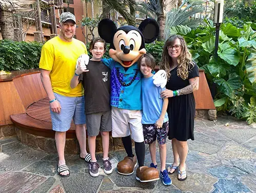 Stephanie Lawless and Family with Mickey Mouse and Walt Disney World