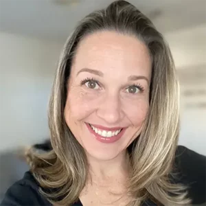 Headshot of Taylor Reyna, a Travel Agent at Favorite Grampy Travels.