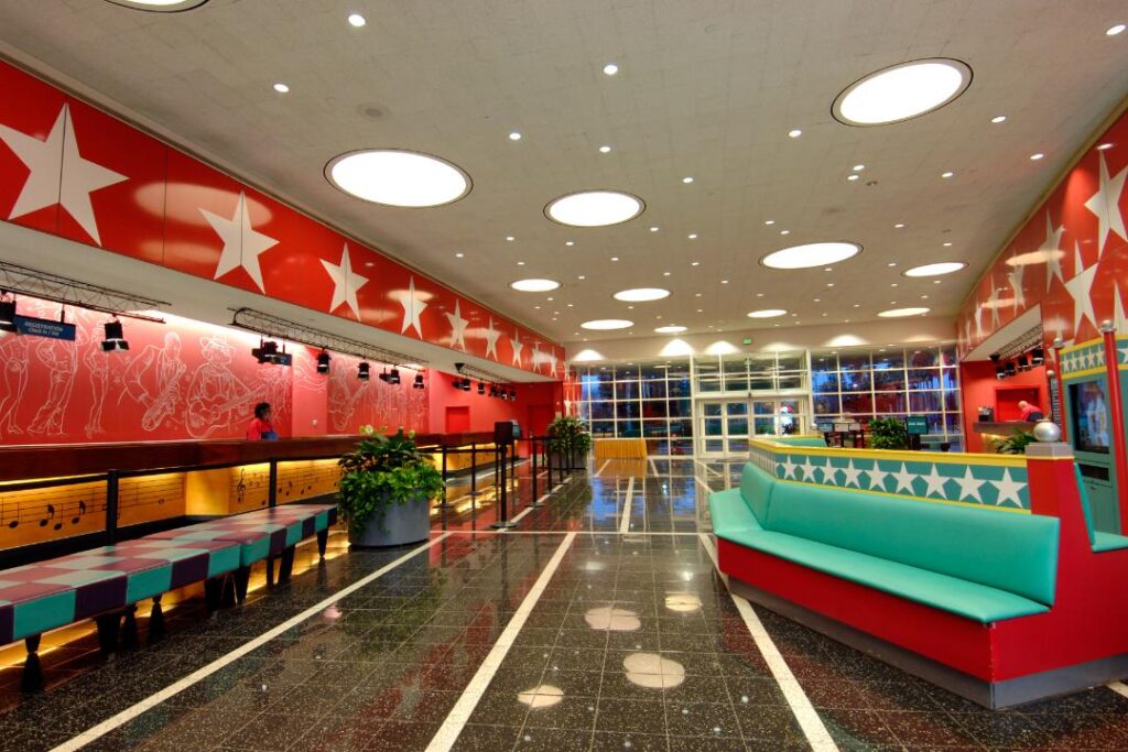 Registration desk in the music themed lobby at Disney All-Star Music Resort