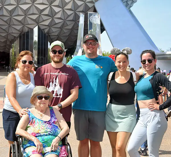 Favorite Grampy Travels Travel Agent Kaila Simmons with Family at Epcot