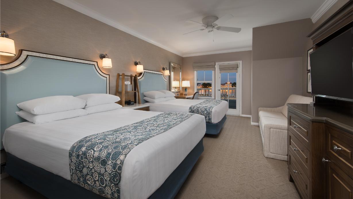 Guest room at Disney's Beach Club Resort with two queen beds and a daybed