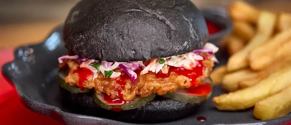 universal epic universe dark universe das stakehaus blood orange chicken sandwhich universal epic universe dark universe das stakehaus blood orange chicken sandwhich