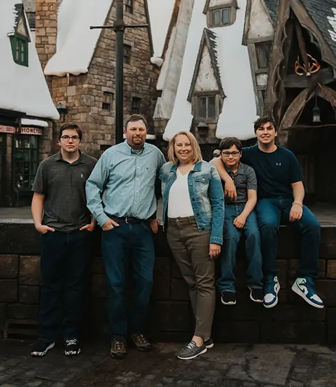 Holly Neth with Family in the Wizarding World of Harry Potter at Universal Studios - Favorite Grampy Travels 2026