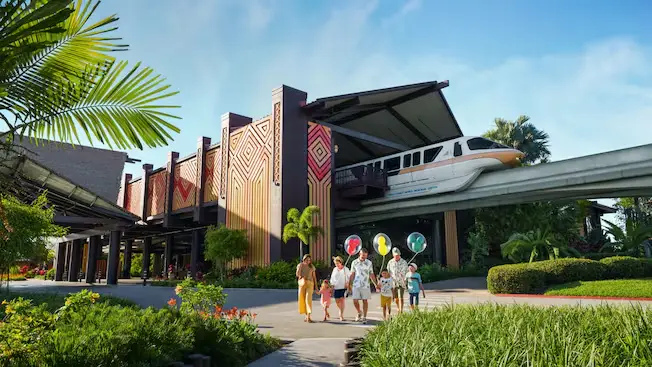 a Family Walks Outside Disney's Polynesian Village Resort as a monorail passes overhead on an elevated track. Lush greenery, palm trees, and blue sky create a vibrant, welcoming atmosphere. - Favorite Grampy Travels