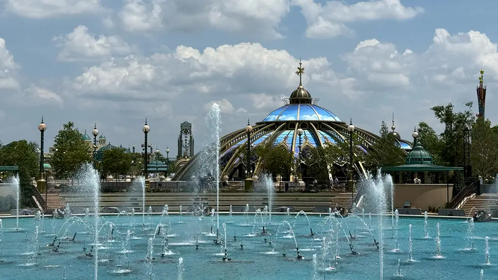 Quiet fountains and the Constellation Carousel in Celestial Park at Universal Epic Universe