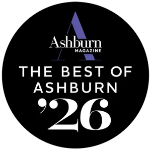 a Black Circle with Ashburn Magazine at the Top and the Text the Best of Ashburn 26 in White, Bold Letters. - Favorite Grampy Travels - Favorite Grampy Travels 2026 - Favorite Grampy Travels 2026