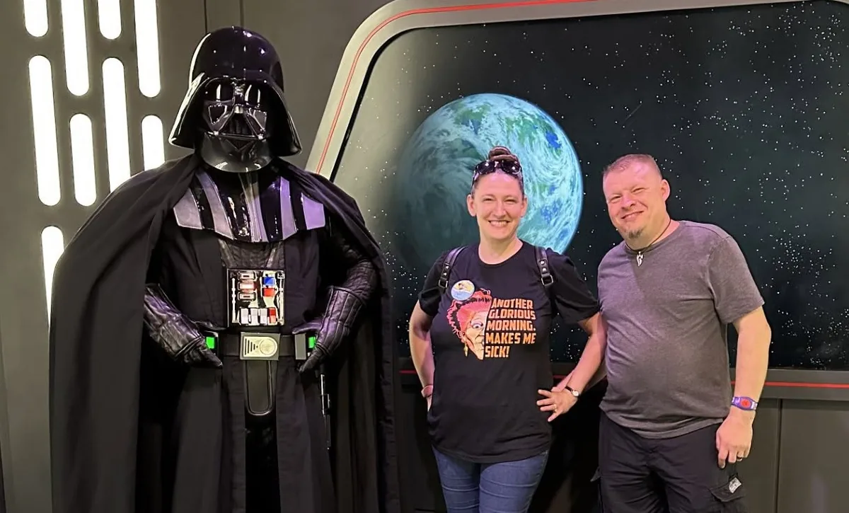 Bryan Cullen and his wife meeting Darth Vader on a Disney trip
