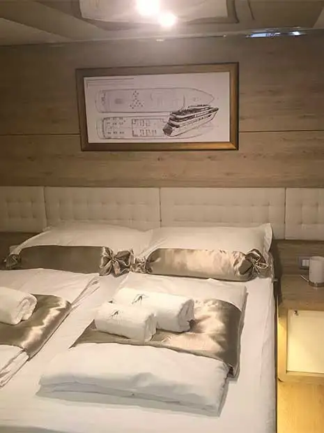 A main deck inside cabin on the yacht Lastavica showing the sofa that converts to a third bed for a small child