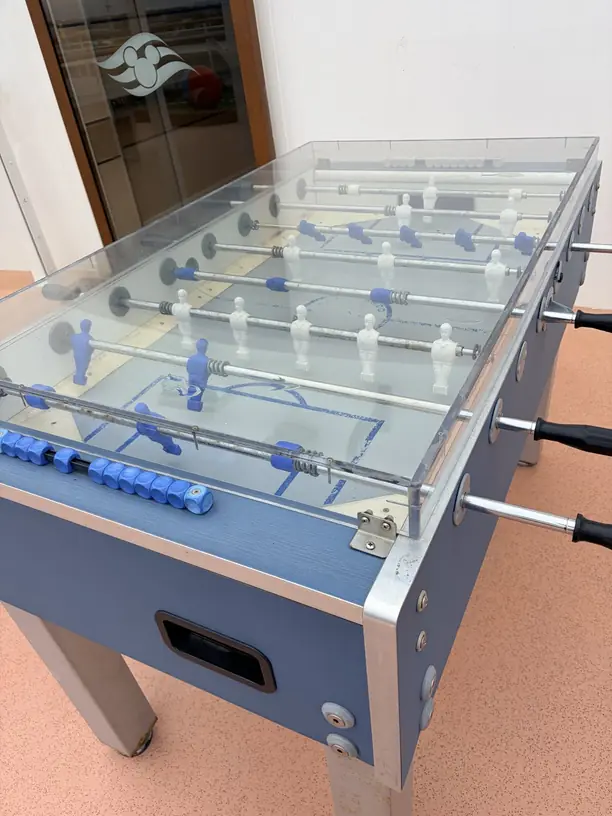 Foosball table on the sports deck of a Disney cruise ship