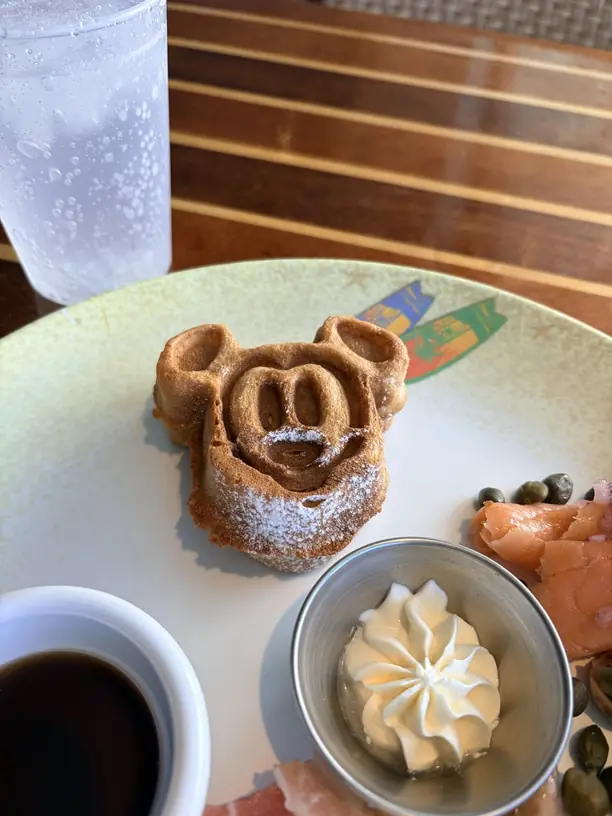 A Mickey shaped waffle at breakfast on a Disney cruise