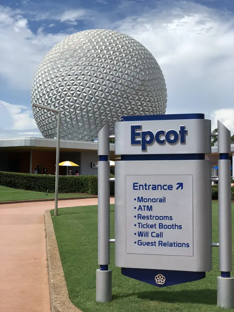 EPCOT entrance sign in front of Spaceship Earth