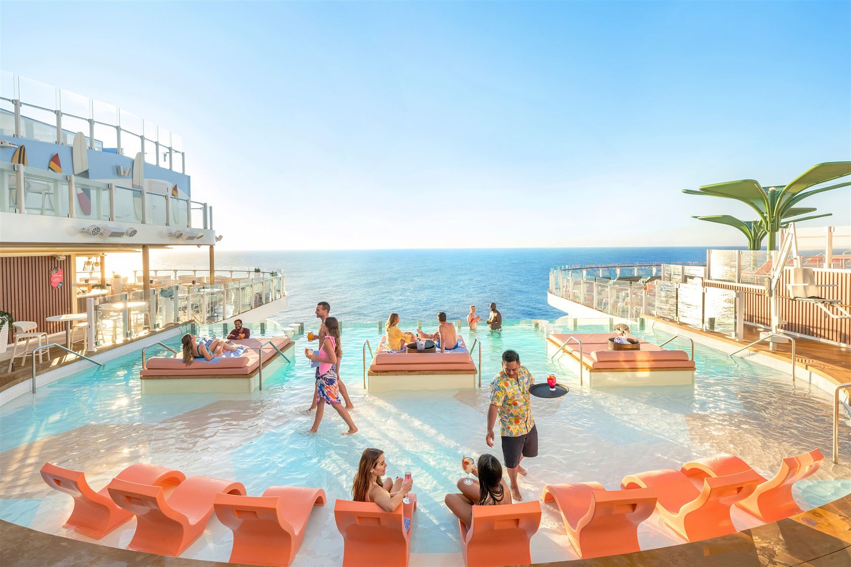 Adults relaxing in The Hideaway infinity pool at the back of Icon of the Seas