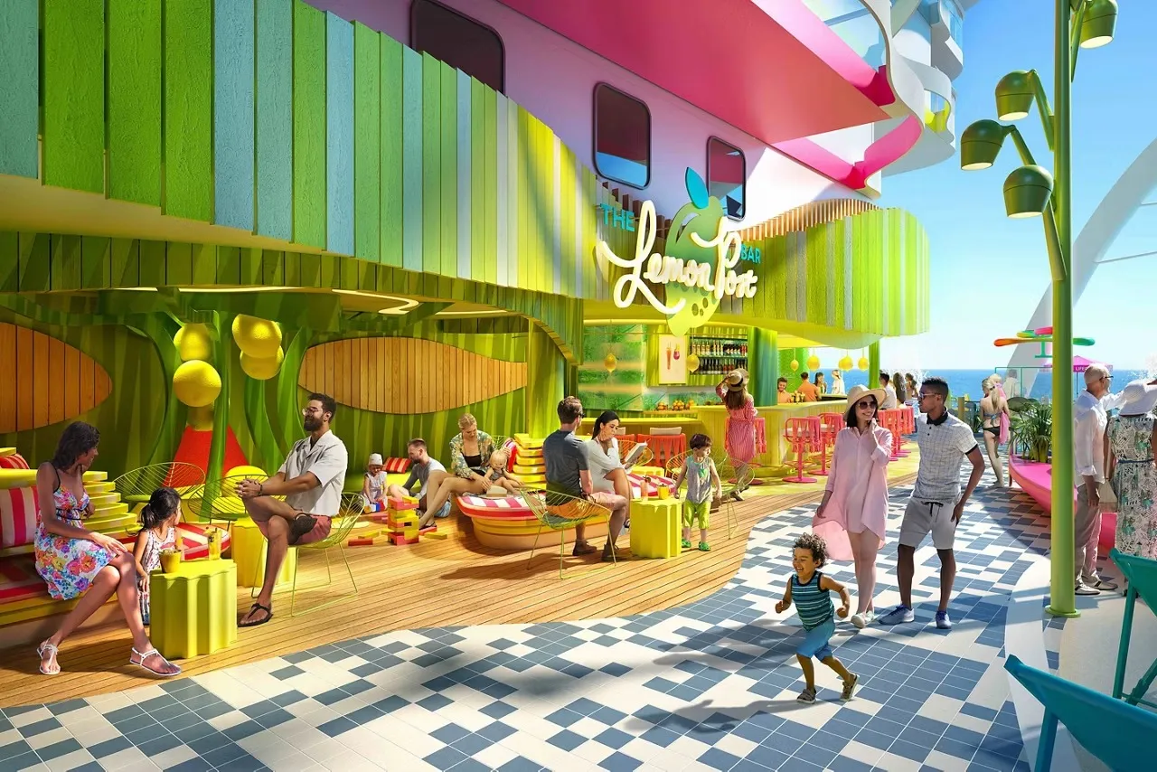 Families relaxing outside The Lemon Post bar in the Surfside neighborhood on Icon of the Seas