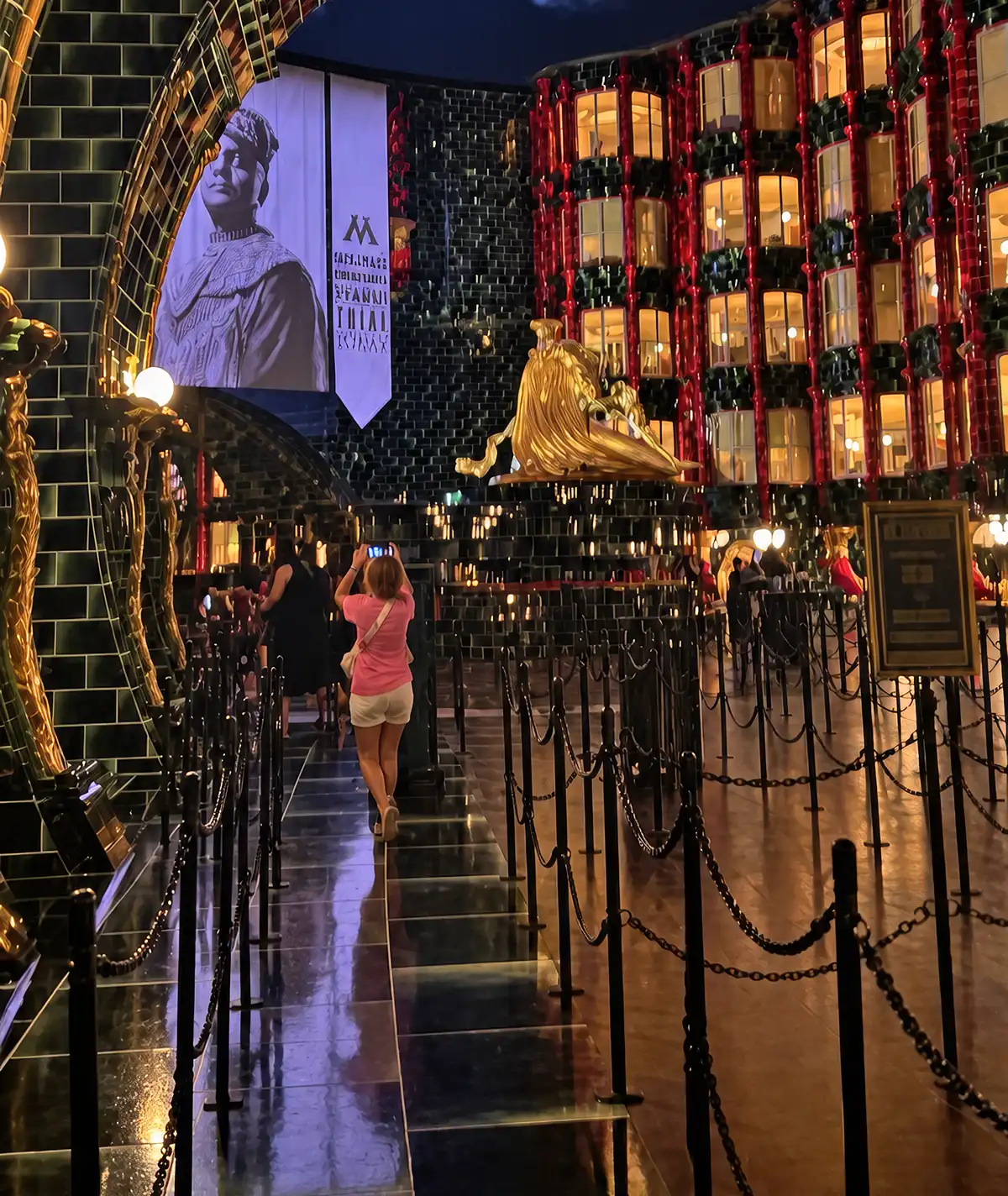 An open queue area inside the Ministry of Magic with few guests during Universal Nights