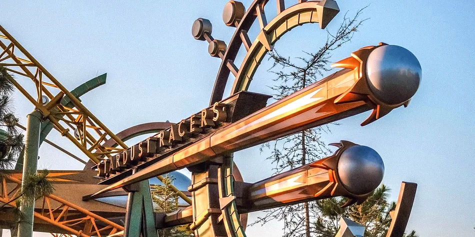 The Stardust Racers rocket sign glowing at sunset in Epic Universe at Universal Orlando - Favorite Grampy Travels